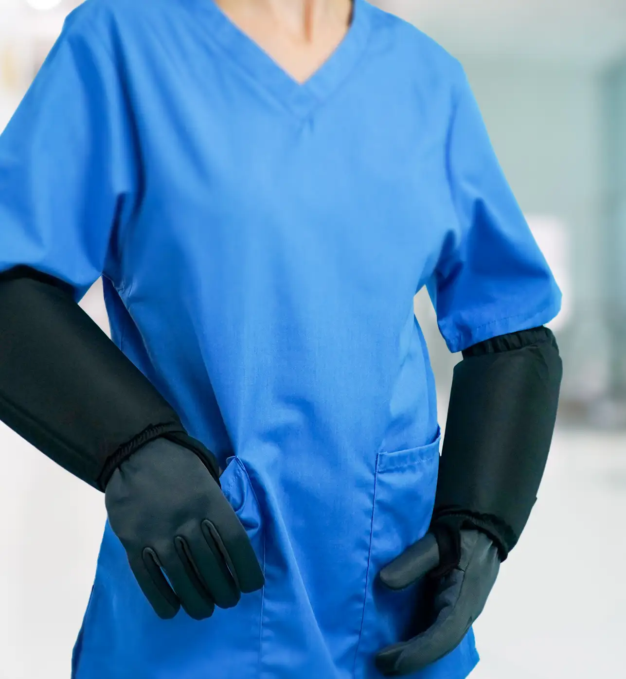Healthcare professional wearing BitePRO Version 1 arm guards for bite protection